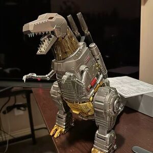 Hasbro Metallic Gray and Gold Robotic Dinosaur